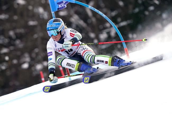 Slovenia's Meta Hrovat speeds down the course of an alpine ski, women's World Cup giant slalom, in Kranjska Gora, Slovenia, Sunday, Jan. 17, 2021. (AP Photo/ Giovanni Auletta)