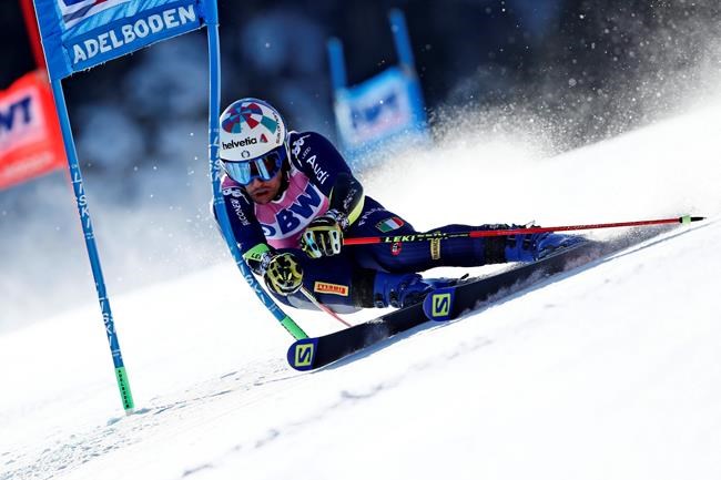Italy's Luca De Aliprandini competes during the first run of an alpine ski, World Cup men's giant slalom in Adelboden, Switzerland, Saturday, Jan. 11, 2020. (AP Photo/Gabriele Facciotti)