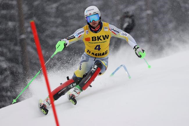 Norway's Sebastian Foss Solevaag speeds down the course during an alpine ski, men's World Cup slalom in Flachau, Austria, Saturday, Jan. 16, 2021. (AP Photo/Alessandro Trovati)