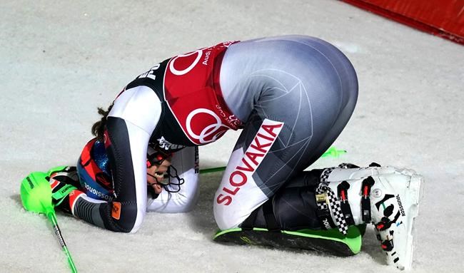 Slovakia's Petra Vlhova celebrates as she arrives at the finish area of an alpine ski, women's World Cup Slalom, in Zagreb, Croatia, Sunday, Jan. 3, 2021. (AP Photo/Giovanni Auletta)