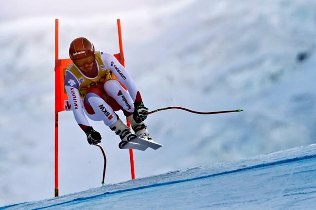 Switzerland's Gilles Roulin competes during the first run of an alpine ski, men's World Cup combined in Wengen, Switzerland, Friday, Jan. 17, 2020. (AP Photo/Gabriele Facciotti)