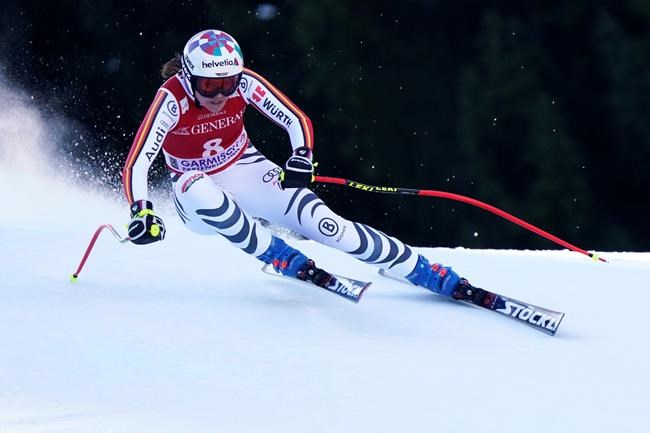 Germany's Viktoria Rebensburg competes during an alpine ski, women's World Cup downhill, in Garmish Partenkirchen, Germany, Saturday, Feb. 8, 2020. (AP Photo/Gianni Auletta)