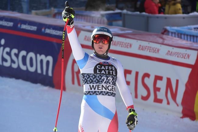 Switzerland's Niels Hintermann reacts in the finish area of an alpine ski, World Cup men's downhill in Wengen, Switzerland, Saturday, Jan. 18, 2020. (AP Photo/Marco Tacca)