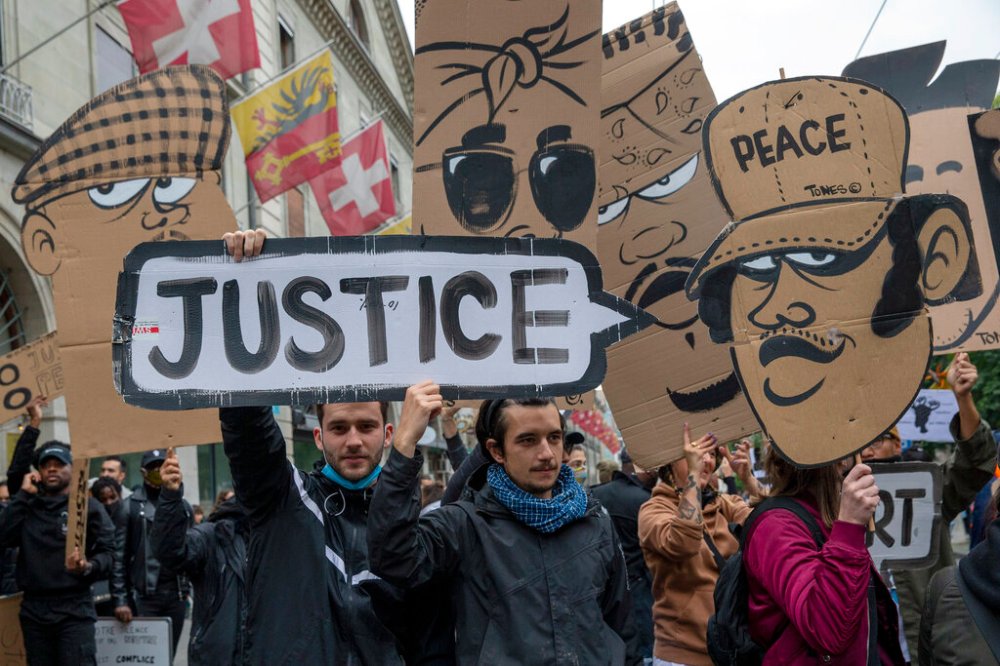 Black Lives Matter protests and calls for police reform have been spreading around the world, including in Geneva, Switzerland. (Salvatore Di Nolfi / Keystone files)
