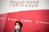Seiko Hashimoto, president of Tokyo 2020 attends a media huddle following the IOC Executive Board Meeting at the Tokyo 2020 headquarters in Tokyo, Wednesday, April 21, 2021. (Philip Fong/ Pool Photo via AP)