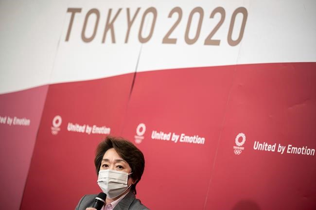 Seiko Hashimoto, president of Tokyo 2020 attends a media huddle following the IOC Executive Board Meeting at the Tokyo 2020 headquarters in Tokyo, Wednesday, April 21, 2021. (Philip Fong/ Pool Photo via AP)