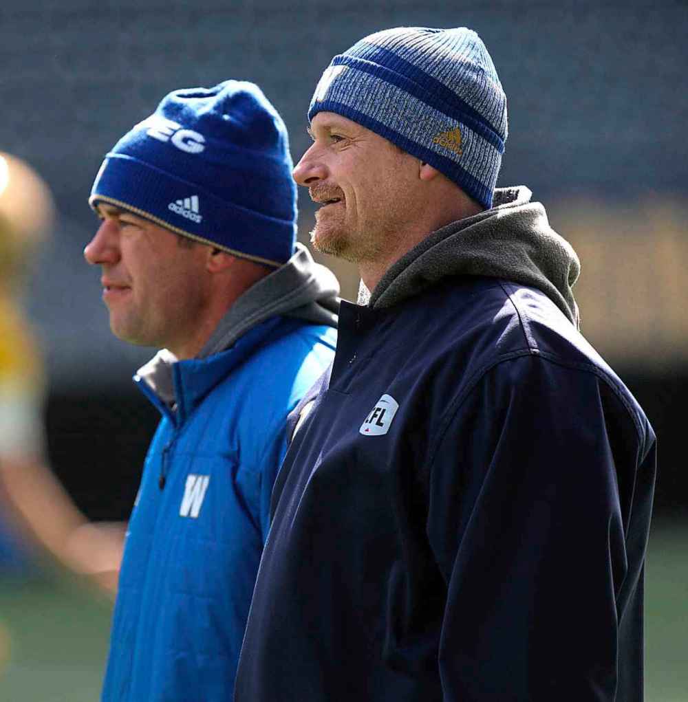 WAYNE GLOWACKI / WINNIPEG FREE PRESS FILES
The Blue Bombers signed head coach Mike O’Shea, right, and general manager Kyle Walters to three year extensions in December.