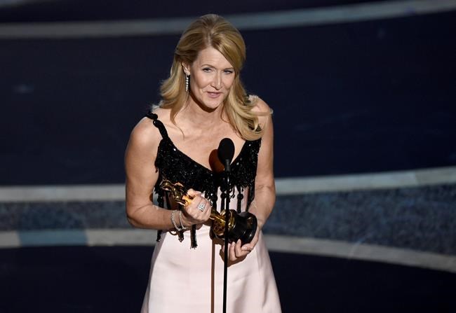 Laura Dern accepts the award for best performance by an actress in a supporting role for