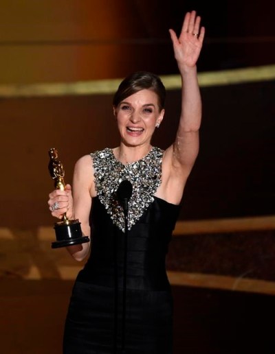 Hildur Guonadottir accepts the award for best original score for 