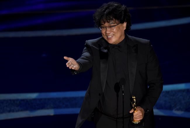 Bong Joon Ho accepts the award for best director for