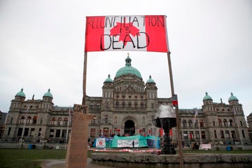 Wet'suwet'en protesters camp out in front of legislature before the speech from the throne in Victoria, B.C., on Tuesday, February 11, 2020. THE CANADIAN PRESS/Chad Hipolito