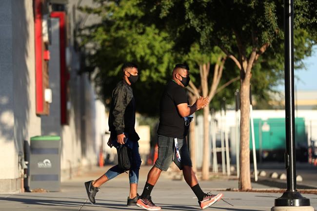 Members of the San Jose Earthquakes depart the stadium where the team had been scheduled to play the Portland Timbers in an MLS soccer match in San Jose, Calif., Wednesday, Aug. 26, 2020. Major League Soccer players boycotted five games Wednesday night in a collective statement against racial injustice. The players' action came after all three NBA playoff games were called off in a protest over the police shooting of Jacob Blake in Wisconsin on Sunday night.
