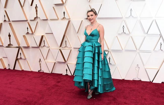 Florence Pugh arrives at the Oscars on Sunday, Feb. 9, 2020, at the Dolby Theatre in Los Angeles. (Photo by Jordan Strauss/Invision/AP)