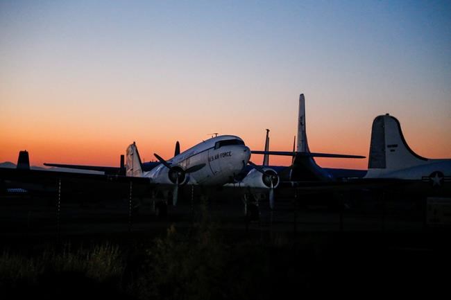 A U.S. Air Force plane sits at the March Field Air Museum near March Air Reserve Base in Riverside, Calif. Jan. 29, 2020. An airplane carrying U.S. citizens being evacuated from Wuhan, China, will take off at March Air Reserve Base this morning. (AP Photo/Ringo H.W. Chiu)
