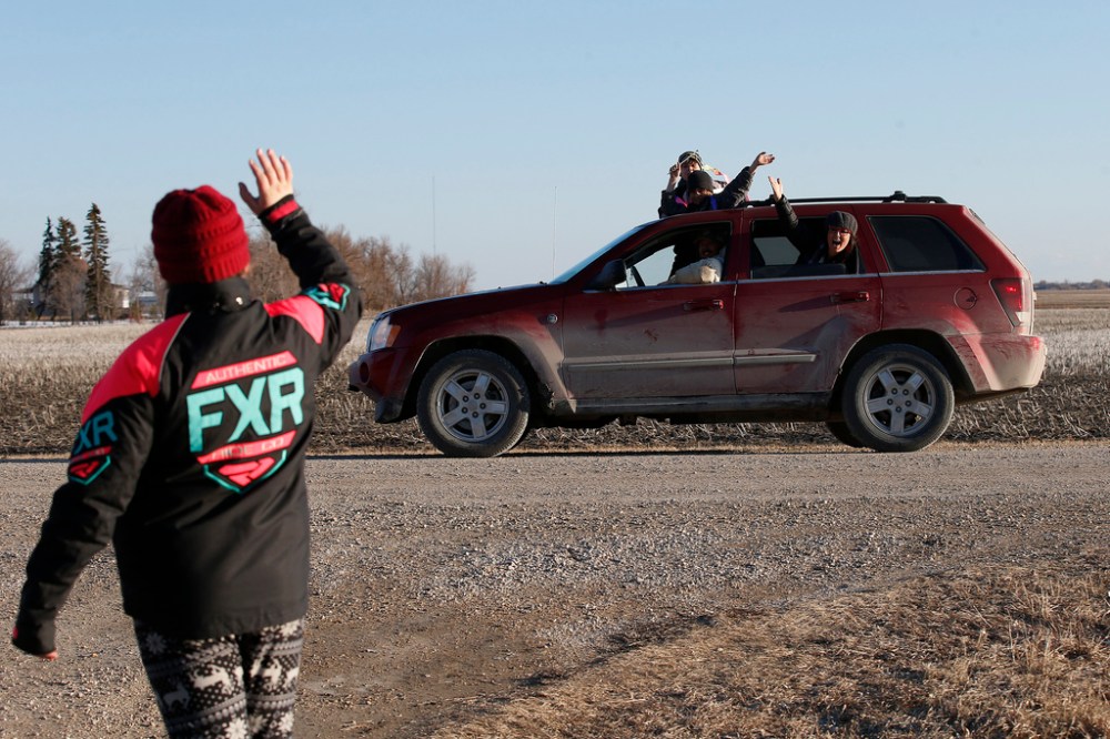 JOHN WOODS / WINNIPEG FREE PRESS
Mya Richard greets family and friends as they drive by on her birthday.
