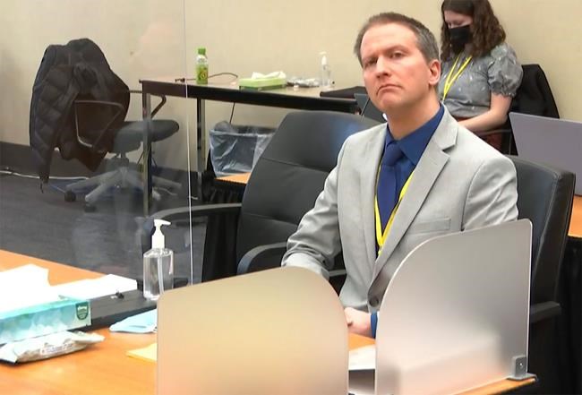 In this image from video, former Minneapolis police Officer Derek Chauvin listens as his defense attorney Eric Nelson gives closing arguments as Hennepin County Judge Peter Cahill preside Monday, April 19, 2021, in the trial of Chauvin at the Hennepin County Courthouse in Minneapolis. Chauvin is charged in the May 25, 2020 death of George Floyd , Minn. (Court TV via AP, Pool)