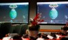 Monitors are illuminated in the NORAD Tracks Santa center at Peterson Air Force Base, Monday, Dec. 23, 2019, in Colorado Springs, Colo. More than 1,500 volunteers will answer an estimated 140,000 telephone calls from childfren and their parents who will be checking on the whereabouts of Santa Clau on Christmas Eve. (AP Photo/David Zalubowski)