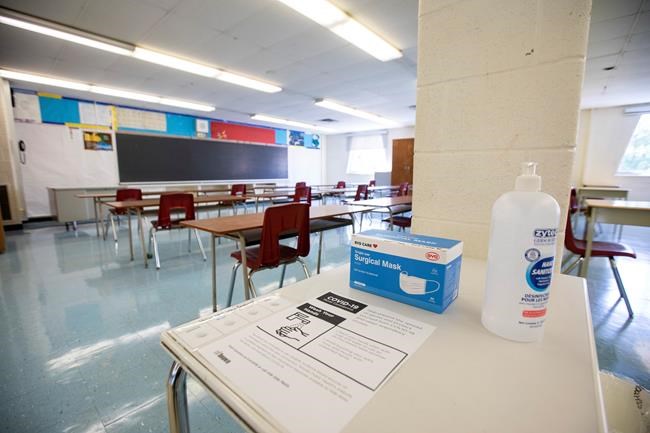 A physically distanced classroom with masks and hand sanitizer is seen at Kensington Community School amidst the COVID-19 pandemic on Tuesday, September 1, 2020. THE CANADIAN PRESS/Carlos Osorio