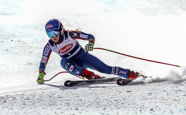 FILE - In this Nov. 15, 2017, file photo, Mikaela Shiffrin gets low in her turn during a downhill training run at Copper Mountain, Colo. Shiffrin and the U.S. women's ski team, along with the men's Europa squad, returned to snow for a June camp in Copper Mountain, Colorado. It was a chance to go fast on the slopes again after the season abruptly ended in March due to the coronavirus pandemic. (Chris Dillmann/Vail Daily via AP, File)