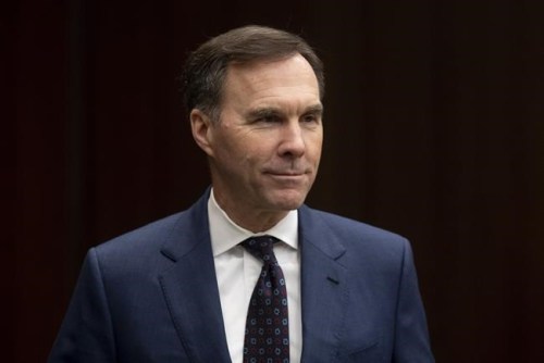 Minister of Finance Bill Morneau waits to appear before the House of Commons Finance committee in Ottawa, Wednesday, February 19, 2020. THE CANADIAN PRESS/Adrian Wyld