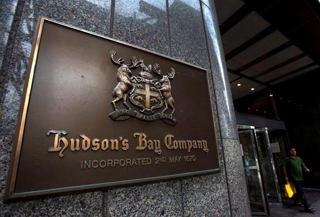 A Hudson's Bay Co. store sign is shown in Toronto on Monday, July 29, 2013. _ Catalyst Capital Group Inc. is making a rival takeover offer for Hudson's Bay Co. THE CANADIAN PRESS/Nathan Denette