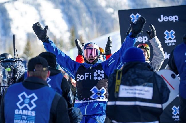 Canada's Mark McMorris raises his arms after seeing his winning score from this third run in the men's snowboard slopestyle final at the X Games in Aspen, Colo., Saturday, Jan. 26, 2019. THE CANADIAN PRESS/AP-The Aspen Times, Anna Stonehouse, *MANDATORY CREDIT*