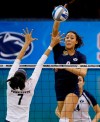 BYU's Alexa Gray (9) hits over Penn State's Nia Grant (7) during the NCAA women's volleyball tournament championship match in Oklahoma City, Saturday, Dec. 20, 2014. Canadian volleyball player Gray feels extra motivation in an upcoming Olympic qualification tournament. THE CANADIAN PRESS/AP/Sue Ogrocki