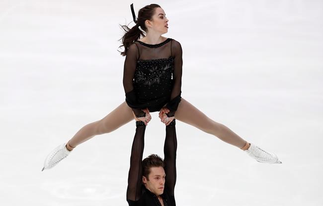 Evelyn Walsh and Trennt Michaud of Canada perform in the pairs short program during the ISU Grand Prix of Figure Skating- Rostelecom Cup in Moscow, Russia, Friday, Nov. 15, 2019. There's a scene in the new Netflix soapy figure skating series