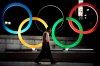 A man walks past the Olympic rings Tuesday, July 23, 2019, in Tokyo, as Japan marks a year-to-go until hosting the summer games with Olympic medals being unveiled Wednesday as part of daylong ceremonies around the Japanese capital. The Canadian Olympic Committee released its marketing guidelines Tuesday for athletes and their personal sponsors during the 2020 Olympics in Tokyo from July 24 through Aug. 9. THE CANADIAN PRESS/AP/Jae C. Hong