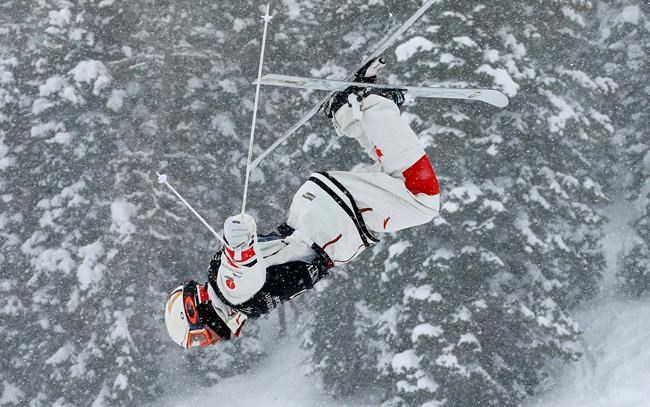 Mikael Kingsbury, of Canada, trains during the men's dual moguls skiing world championship, in Park City, Utah, Saturday, Feb. 9, 2019. Kingsbury won the gold medal Saturday in his 100th career World Cup moguls start. THE CANADIAN PRESS/AP-Rick Bowmer