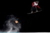 Canada's Darcy Sharpe jumps, backdropped by the moon, in the Men's Snowboard Big Air for the 2019 FIS Big Air World Cup held at the Big Air Shougang in Beijing on Saturday, Dec. 14, 2019. Darcy Sharpe says he goes to sleep feeling happy these days.The snowboarder from Comox, B.C., won his first X Games gold medal last month in Aspen, Colo., and the 24-year-old is among 52 Canadian snowboarders and freestyle skiers competing against the world's best Friday to Sunday at a World Cup in Calgary. THE CANADIAN PRESS/AP, Ng Han Guan