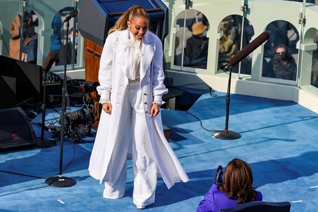Singer Jennifer Lopez greets Vice President-elect Kamala Harris during President-elect Joe Biden’s inauguration, Wednesday, Jan. 20, 2021, at the U.S. Capitol in Washington. (Tasos Katopodis/Pool Photo via AP)