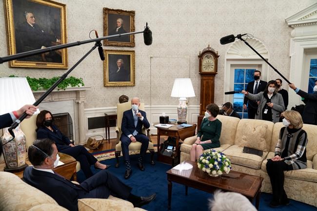 President Joe Biden meets Republican lawmakers to discuss a coronavirus relief package, in the Oval Office of the White House, Monday, Feb. 1, 2021, in Washington. From left, Sen. Mitt Romney, R-Utah, Vice President Kamala Harris, Biden, Sen. Susan Collins, R-Maine, and Sen. Lisa Murkowski, R-Alaska. (AP Photo/Evan Vucci)