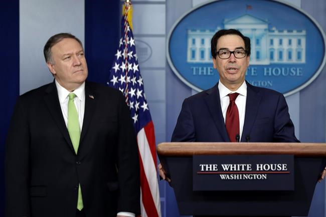 Secretary of State Mike Pompeo and Treasury Secretary Steve Mnuchin brief reporters about additional sanctions placed on Iran, at the White House, Friday, Jan. 10, 2019, in Washington. (AP Photo/ Evan Vucci)