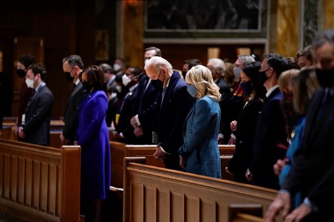 President-elect Joe Biden and his wife Jill Biden attend Mass at the Cathedral of St. Matthew the Apostle during Inauguration Day ceremonies Wednesday, Jan. 20, 2021, in Washington. (AP Photo/Evan Vucci)