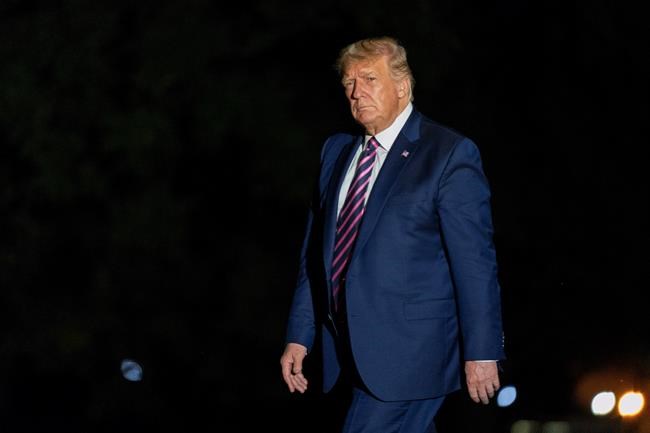 President Donald Trump walks on the South Lawn as he arrives at the White House, Monday, Sept. 14, 2020, in Washington from a trip to Phoenix. (AP Photo/Manuel Balce Ceneta)
