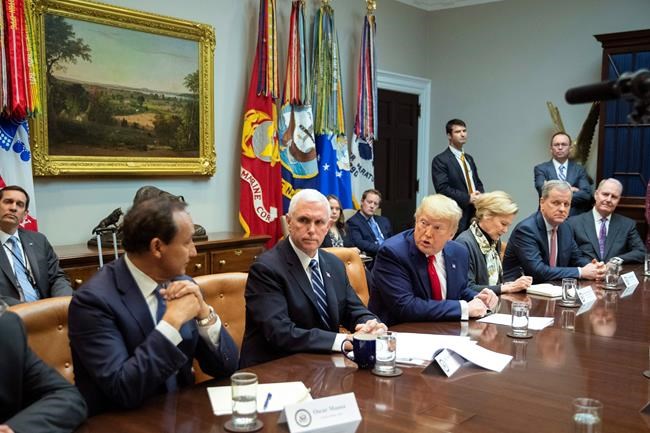 President Donald Trump with, from left, United Airlines CEO Oscar Munos, Vice President Mike Pence, Trump, White House coronavirus response coordinator Dr. Deborah Birx, American Airlines CEO Doug Parker, Southwest CEO Gary Kelly, speaks during a coronavirus briefing with Airline CEOs in at the Roosevelt Room of the White House, Wednesday, March 4, 2020, in Washington. (AP Photo/Manuel Balce Ceneta)