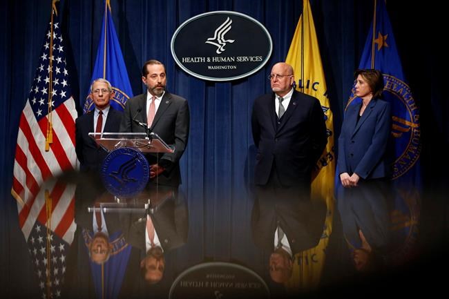 Health and Human Services Secretary Alex Azar speaks at a news conference about the federal government's response to a virus outbreak originating in China, Tuesday, Jan. 28, 2020, in Washington. Standing alongside Azar are National Institute of Allergy and Infectious Diseases Director Anthony Fauci, from left, Centers for Disease Control and Prevention Director Robert Redfield and National Center for Immunization and Respiratory Disease Director Nancy Messonnier. (AP Photo/Patrick Semansky)