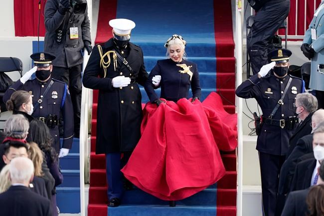 Lady Gaga arrives to sing the National Anthem during the 59th Presidential Inauguration at the U.S. Capitol in Washington, Wednesday, Jan. 20, 2021. (AP Photo/Patrick Semansky, Pool)