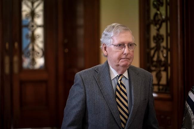 Senate Majority Leader Mitch McConnell, R-Ky., leaves the chamber during a break in the impeachment trial of President Donald Trump on charges of abuse of power and obstruction of Congress, at the Capitol in Washington, Monday, Jan. 27, 2020. (AP Photo/J. Scott Applewhite)