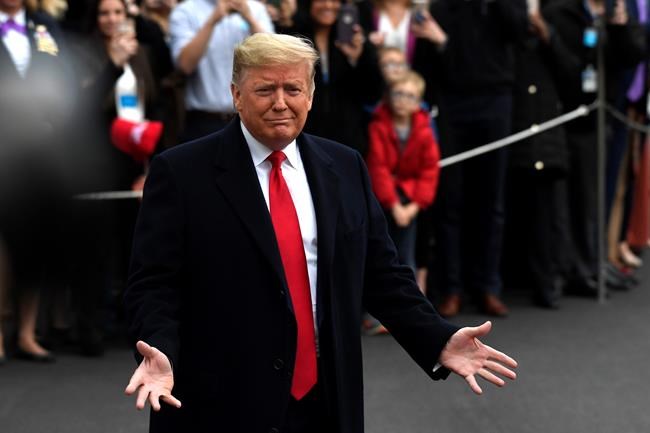 President Donald Trump speaks to the members of the media before leaving the White House, Monday, Jan. 13, 2020, in Washington, for a trip to watch the College Football Playoff national championship game in New Orleans. (AP Photo/Susan Walsh)
