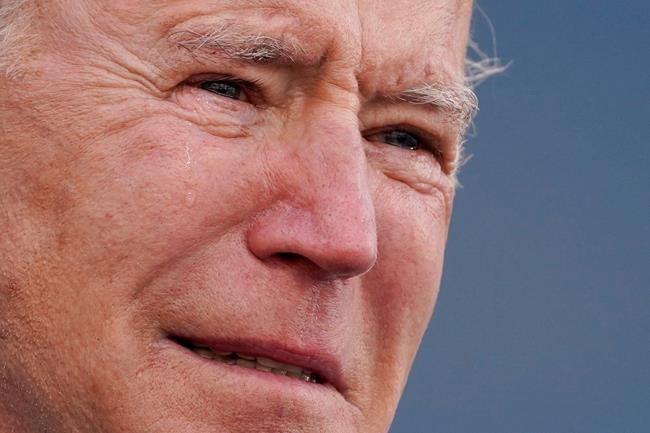 President-elect Joe Biden tears up as he speaks at the Major Joseph R.