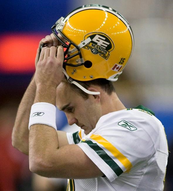 Edmonton Eskimos quarterback Ricky Ray removes his helmet after he failed to score in the final minutes of the fourth quarter during the CFL Eastern Conference final Saturday, Nov. 15, 2008 in Montreal. The Edmonton Eskimos are keeping their team name.The CFL franchise announced Friday it was keeping the Eskimos moniker following