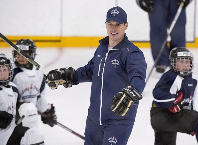 Pittsburgh Penguins captain Sidney Crosby runs a drill at his hockey camp at Cole Harbour Place in Cole Harbour, N.S. on Monday, July 11, 2016. Crosby has added his voice to the chorus of athletes condemning racial injustice. Crosby released a statement through his charitable foundation's Twitter page Wednesday, calling the death of George Floyd something that