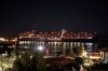 A cargo ship sails through the town of Suez, Egypt, Tuesday, March 30, 2021 as traffic resumed through the Suez canal after it was blocked by a massive ship that had been stuck sideways for nearly a week. (AP Photo/Mohamed Elshahed)