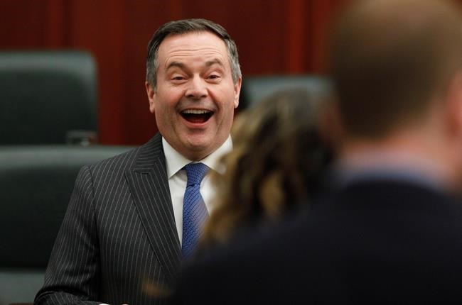 Alberta Premier Jason Kenney has a laugh after the Speech from the Throne in Edmonton, Tuesday, Feb. 25, 2020. THE CANADIAN PRESS/Jason Franson
