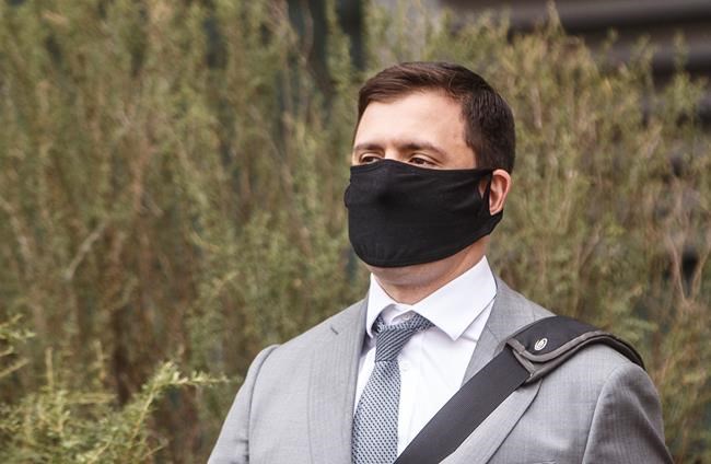 Matthew McKnight walks out of court during a break in Edmonton on Wednesday, July 8, 2020. McKnight, 33, is accused of sexually assaulting 13 women ranging in age from 17 to 22 between 2010 and 2016. THE CANADIAN PRESS/Jason Franson