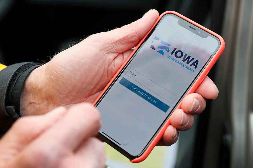 Democrats in Iowa used an untested app to transmit results from polling stations to a central caucus office, where a final and official result would be calculated. The app repeatedly crashed. (Charlie Neibergall / The Associated Press)