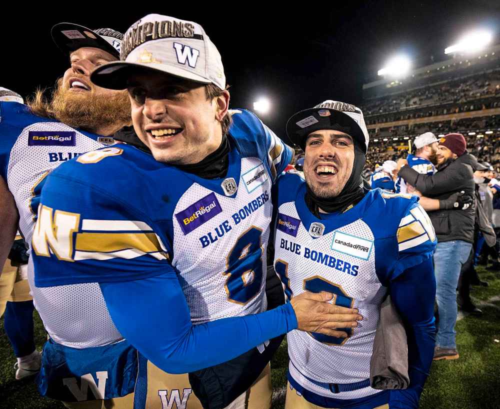 CP
Winnipeg Blue Bombers quarterback Zach Collaros (8) celebrates with kicker Marc Liegghio (13). (Frank Gunn / The Canadian Press)