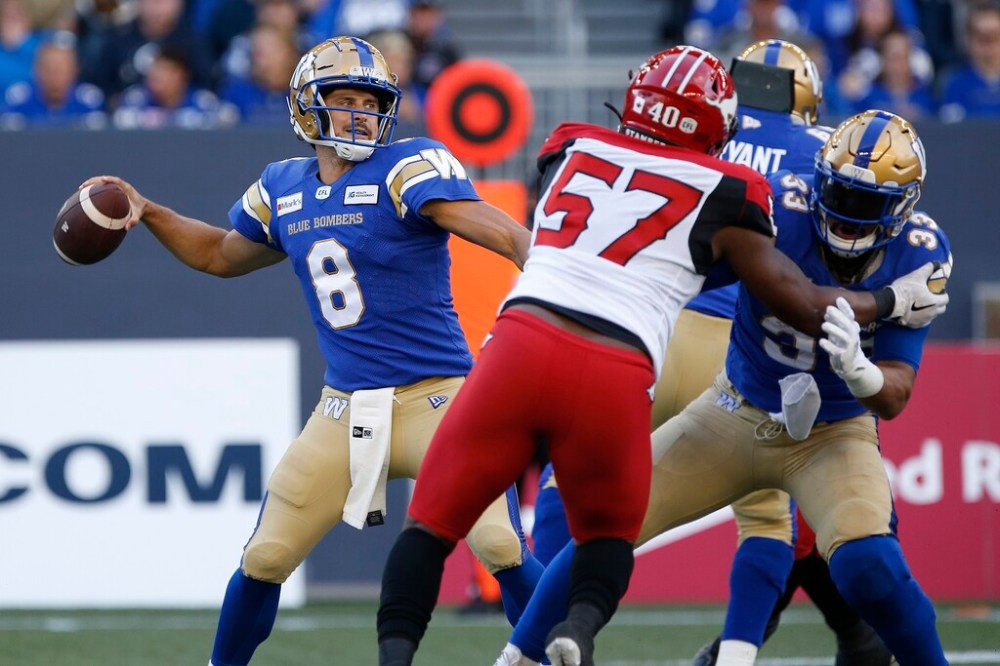 CP
Zach Collaros was getting the ball to his receivers, but a few crucial passes were dropped. (John Woods / The Canadian Press)
